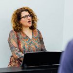 lara teaching folk and world music singing lessons at city academy