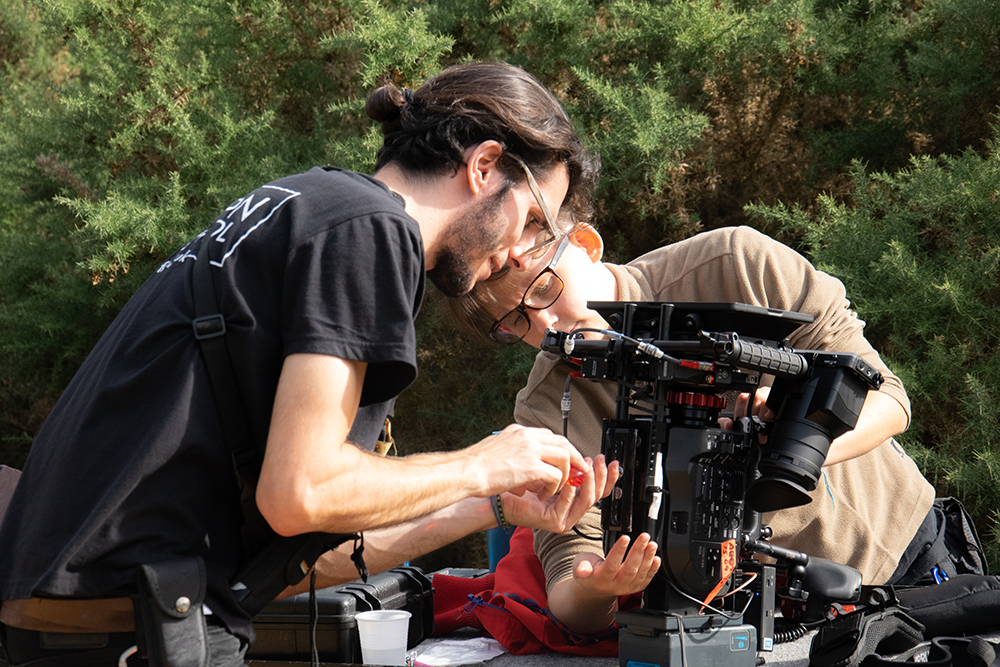Pierro Cioffi and Chloe Delaplace prepping equipment